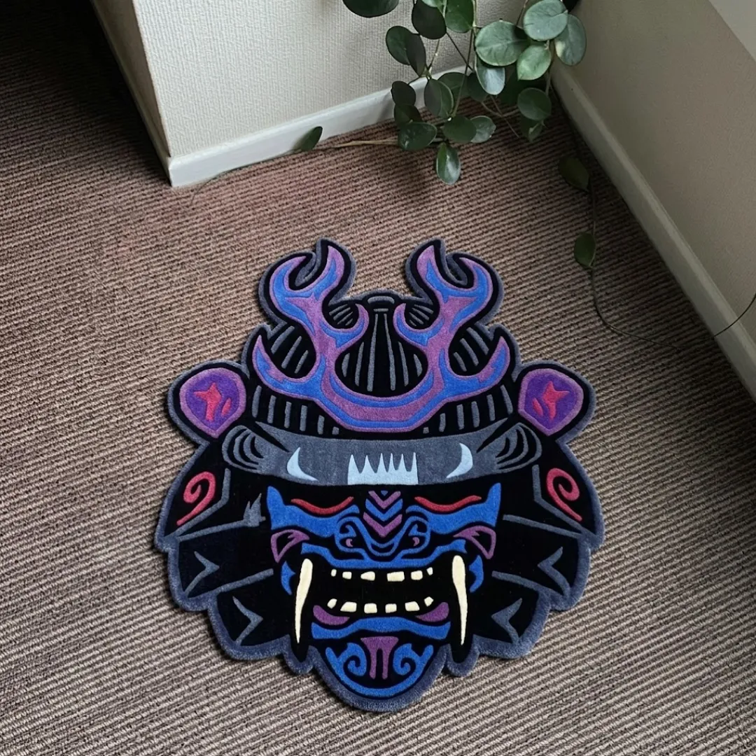 Samurai Oni Mask Japanese demon warrior shaped tufted area rug displayed flat on a textured carpeted floor.