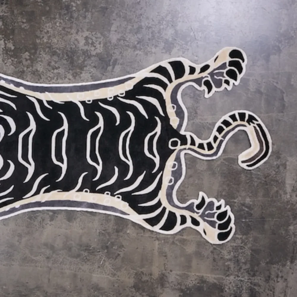 Hand-tufted monochrome tiger print rug in Tibetan style