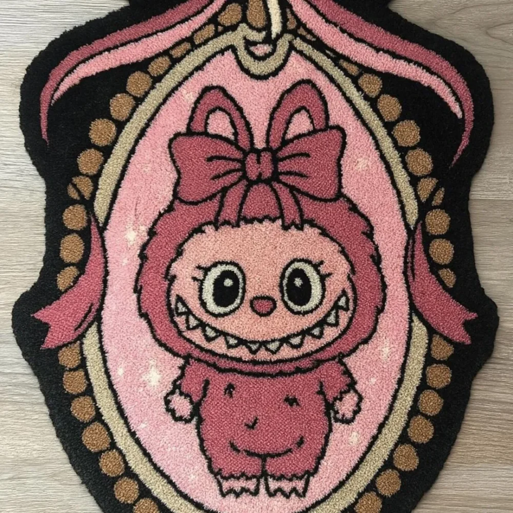 Handmade Labubu area rug with ornate bow-topped frame