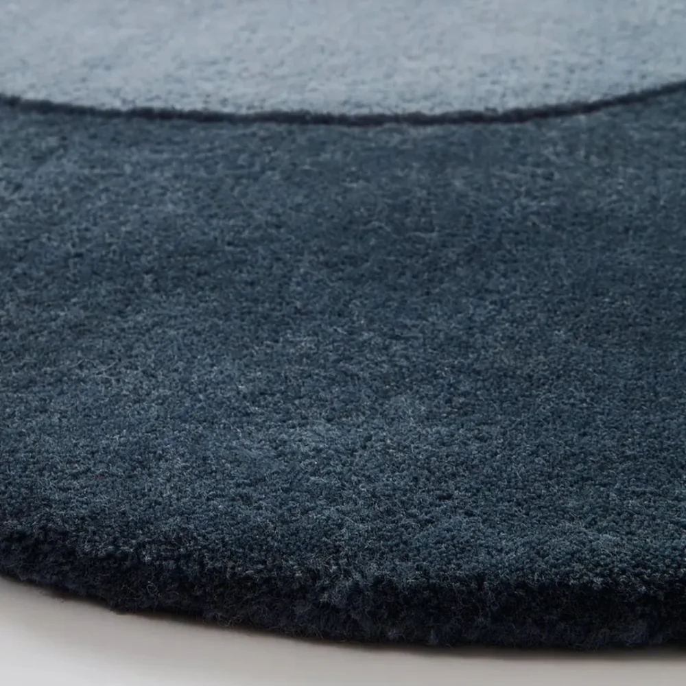 Scalloped wool runner in serene bedroom
