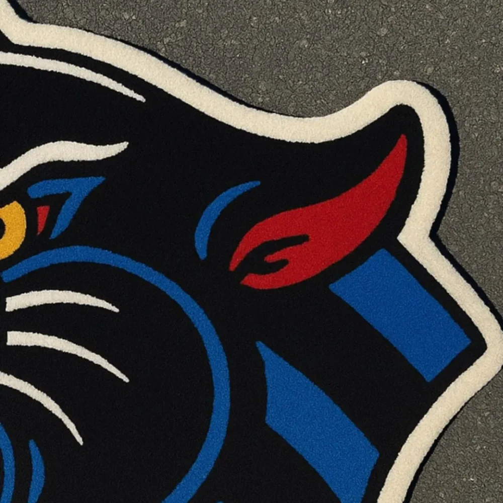 Handmade rug featuring aggressive black panther head design