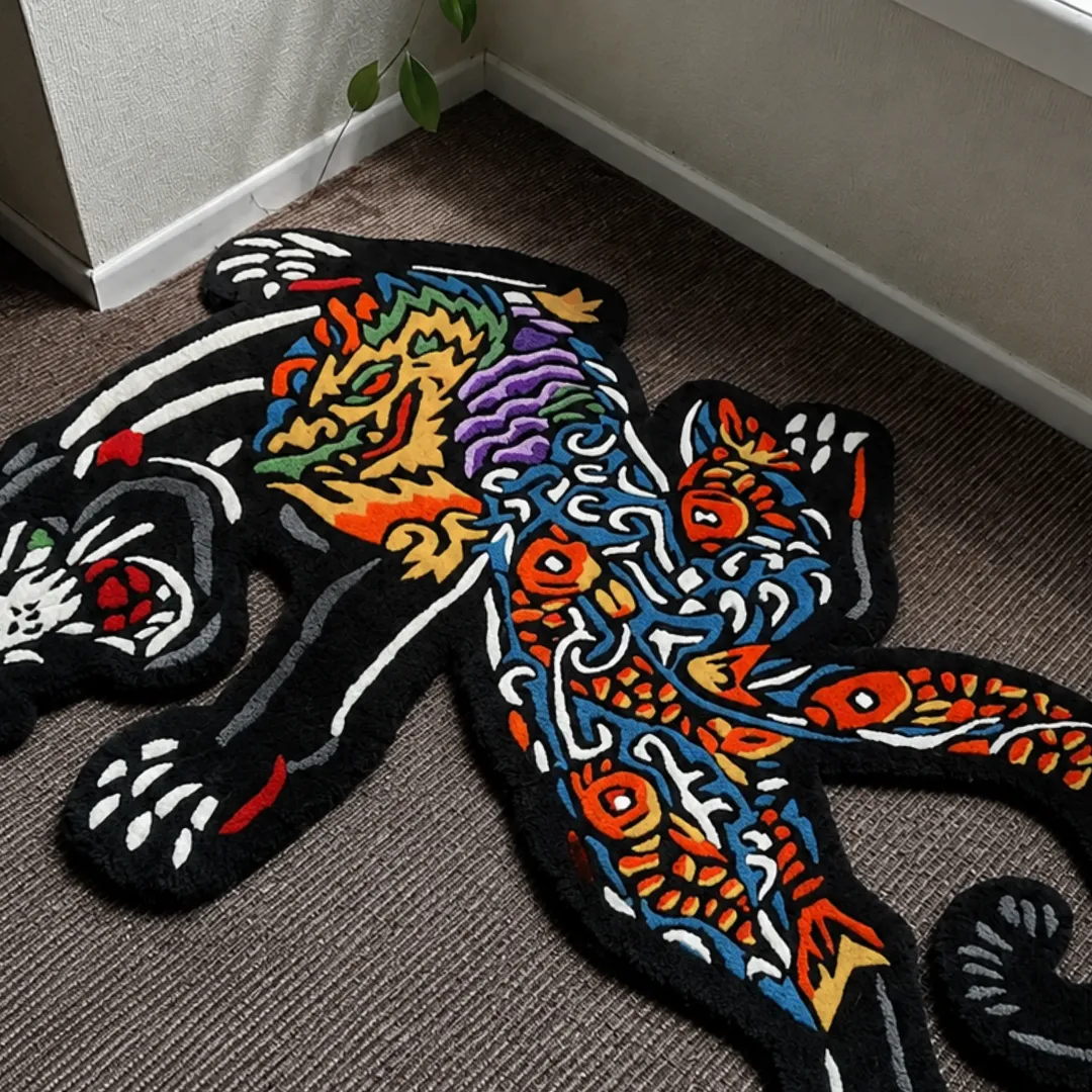 Close-up of the detailed tufted pile texture, intricate Japanese artwork patterns, and vibrant color blocking on the Tattoo Panther rug.