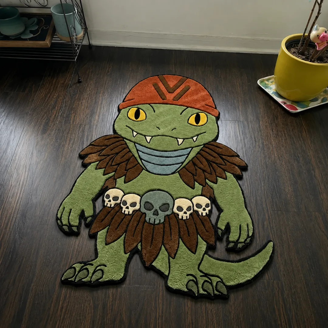 Close-up of the detailed tufted pile texture, green creature design, and skull details on the Warrior Toad rug.