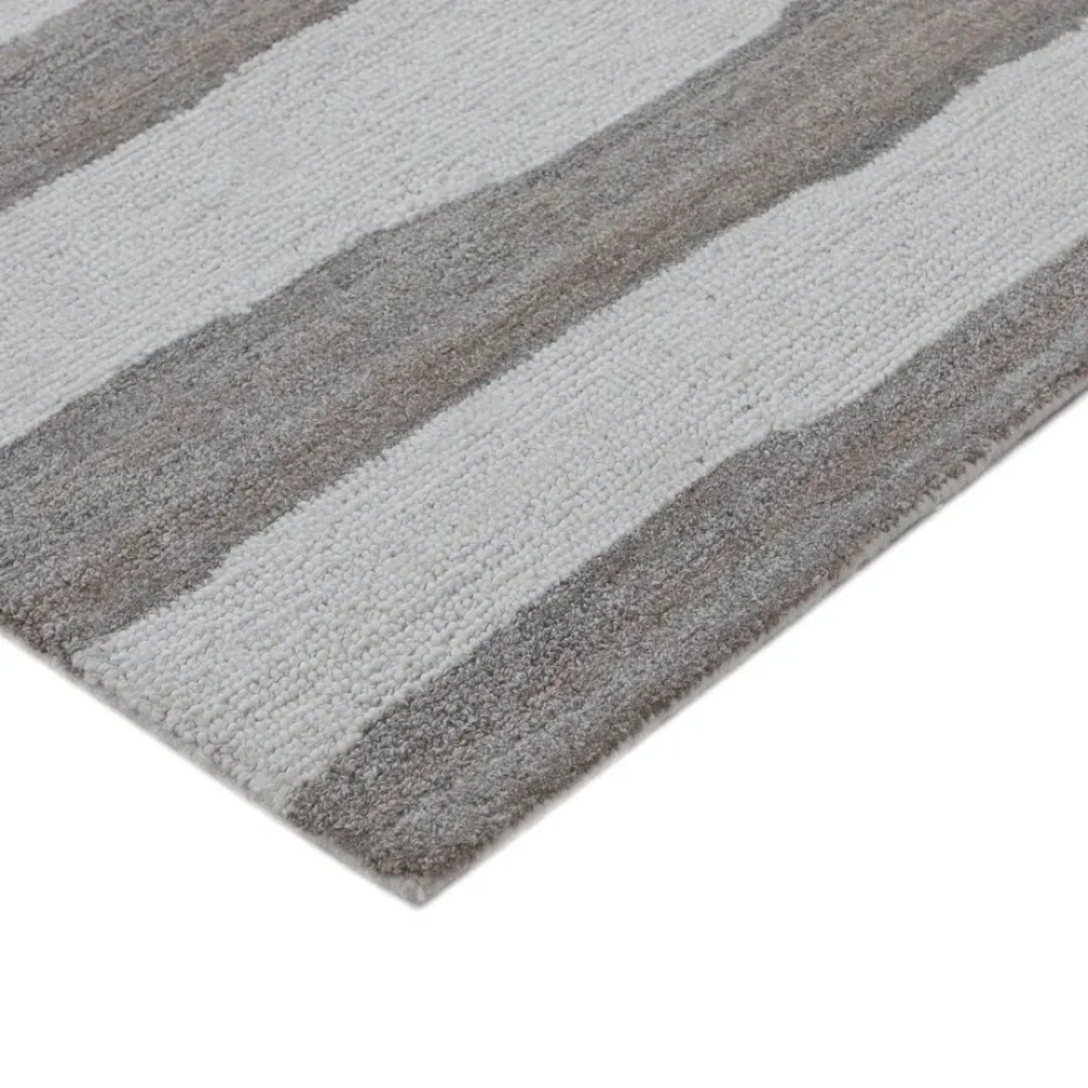 Corner angle showing thickness and warm tones of rug