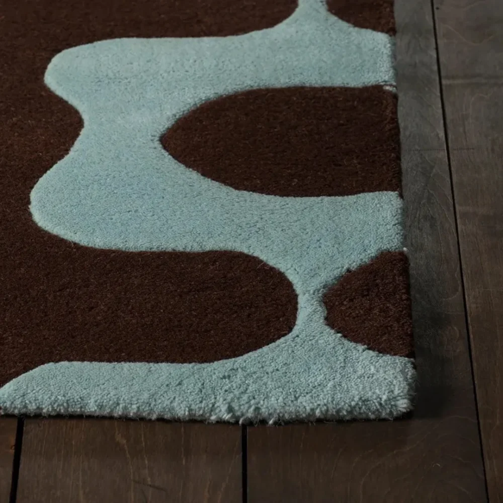 Bold and dynamic wool rug with retro wave pattern