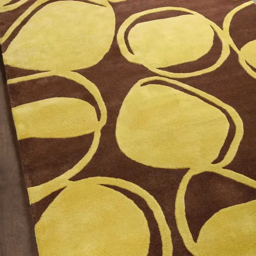 Modern wool rug with vibrant green circle pattern