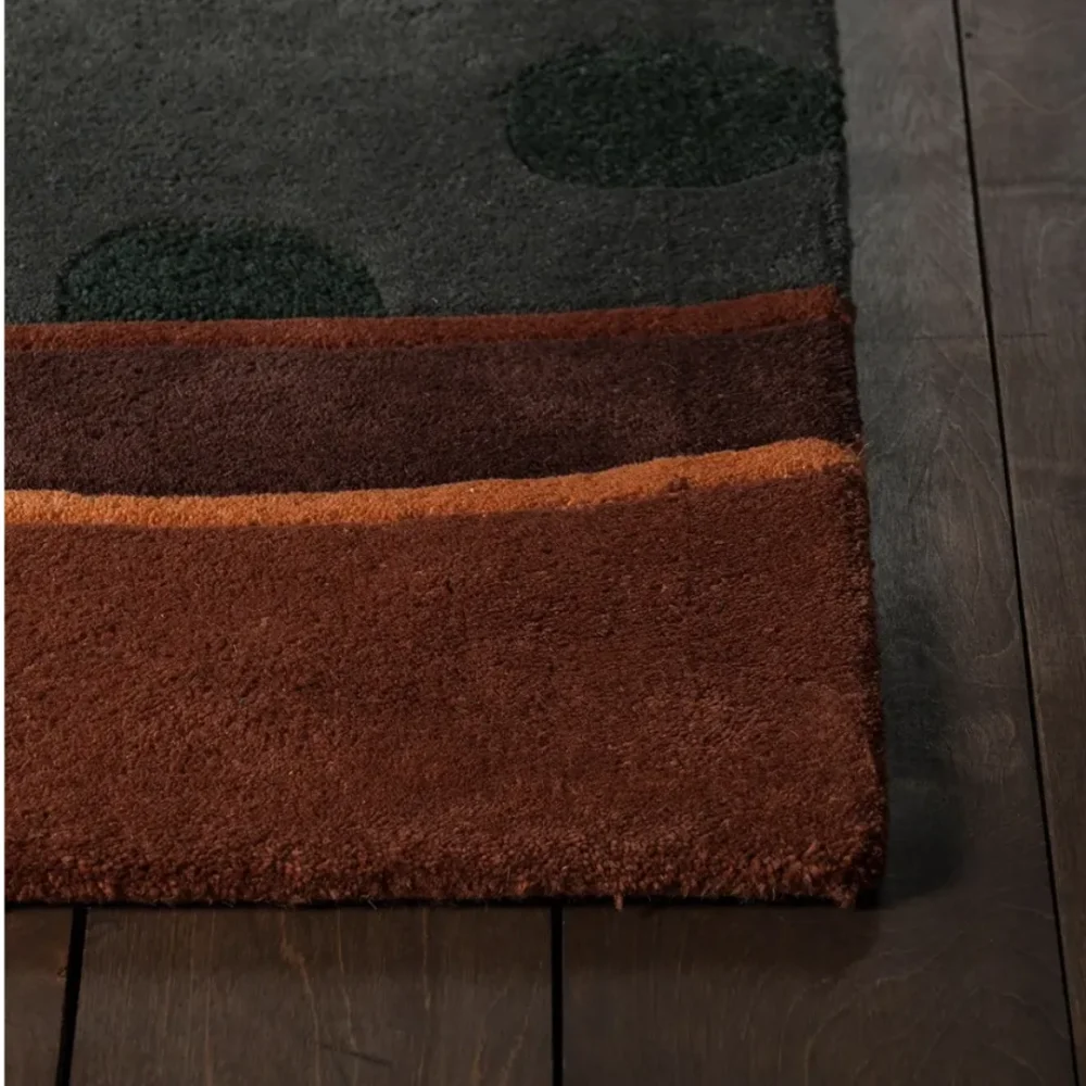 Contemporary rug in earthy colors with artistic design