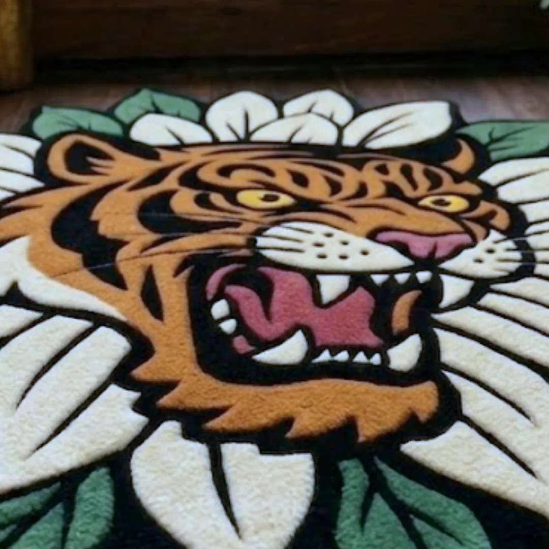 A macro close-up of the tiger flower rug, focusing on the dense, tufted wool pile and the intricate graphic design of the roaring tiger and floral petals.