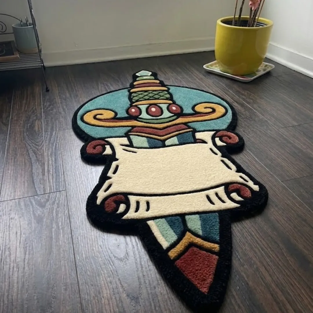 An angled perspective shot of a hand-tufted traditional dagger scroll rug, highlighting its expressive, tattoo-inspired silhouette and high-quality wool texture on a wooden floor.