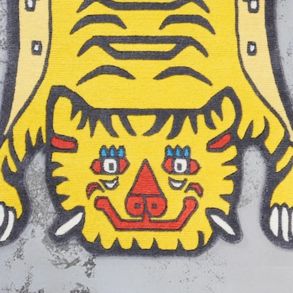 Yellow tiger-shaped rug styled in modern creative room