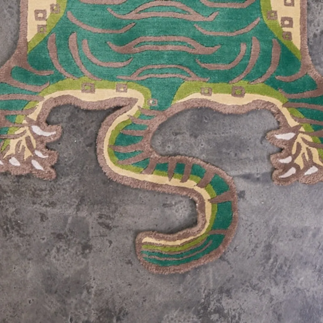 Bold green and beige tiger design with earthy tones on the Jungle Guardian Rug