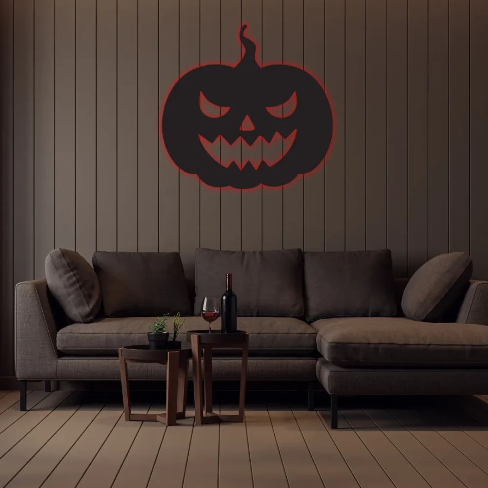 Spooky Halloween pumpkin metal wall hanging above sofa
