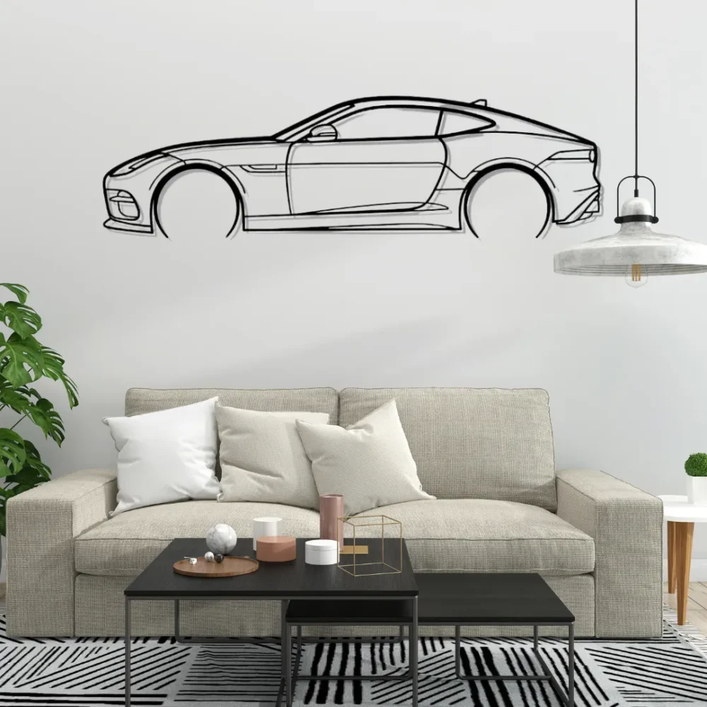 Sports car coupe metal wall art in matte black, luxury car silhouette decor above White sofa in modern living room.