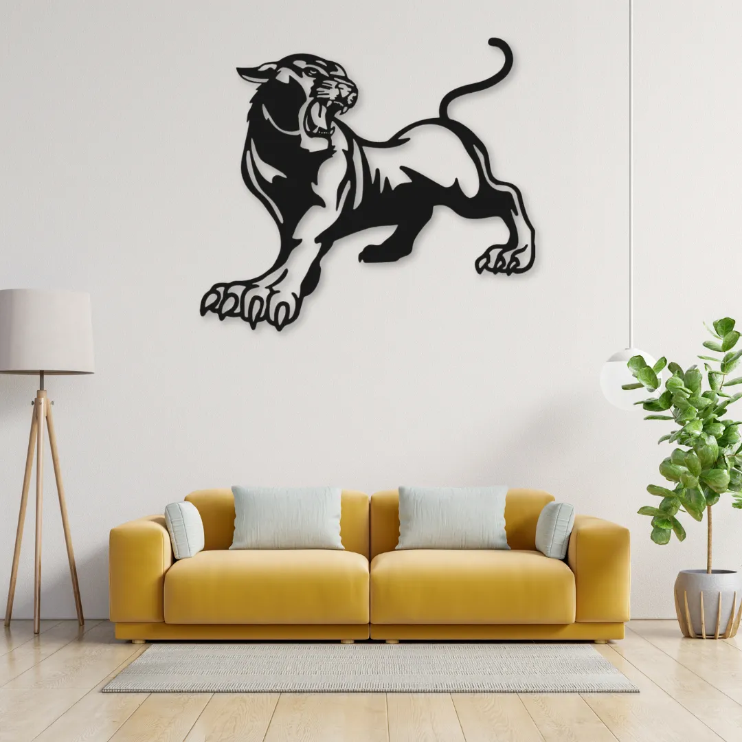 Fierce panther metal wall art above yellow sofa.