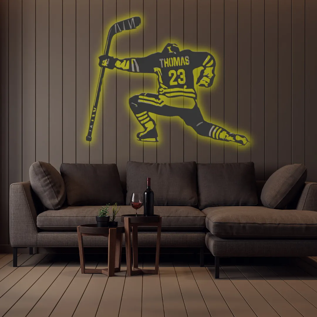 Sports-inspired metal wall art with hockey celebration design