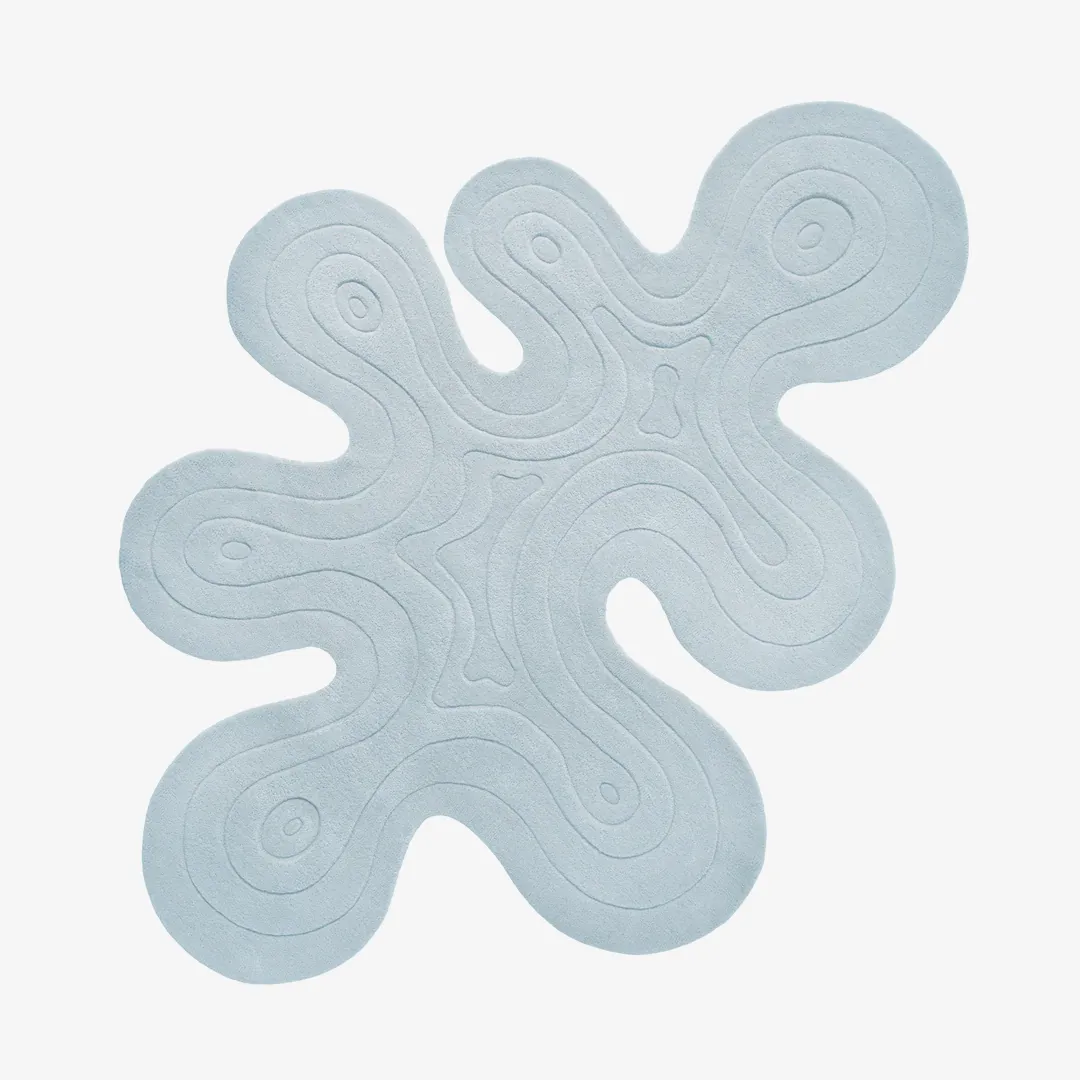 Aqua Splash Rug featuring fluid abstract shape in light blue tones – handmade tufted rug by Sneagear