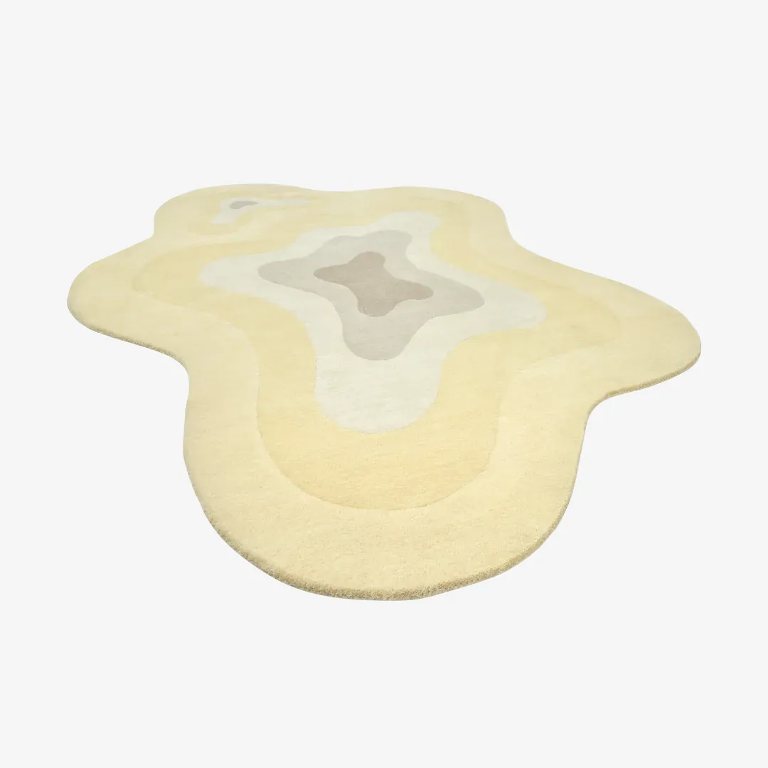 Minimalist Butter Bloom Rug with organic ripple pattern in warm neutral shades – hand-tufted wool rug