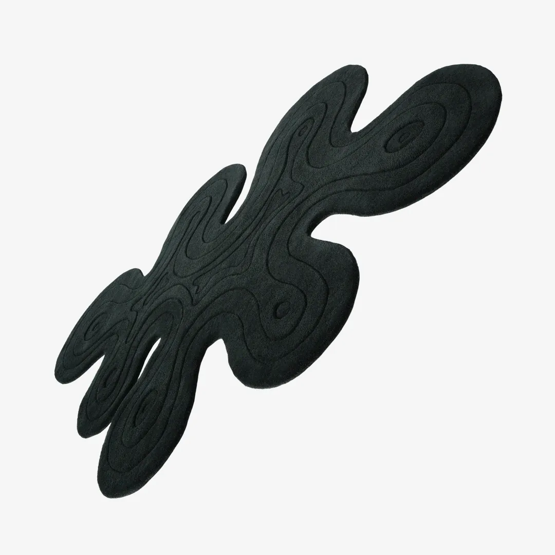 Charcoal Drift Rug featuring abstract organic shape in deep black tones – handmade tufted rug by Sneagear
