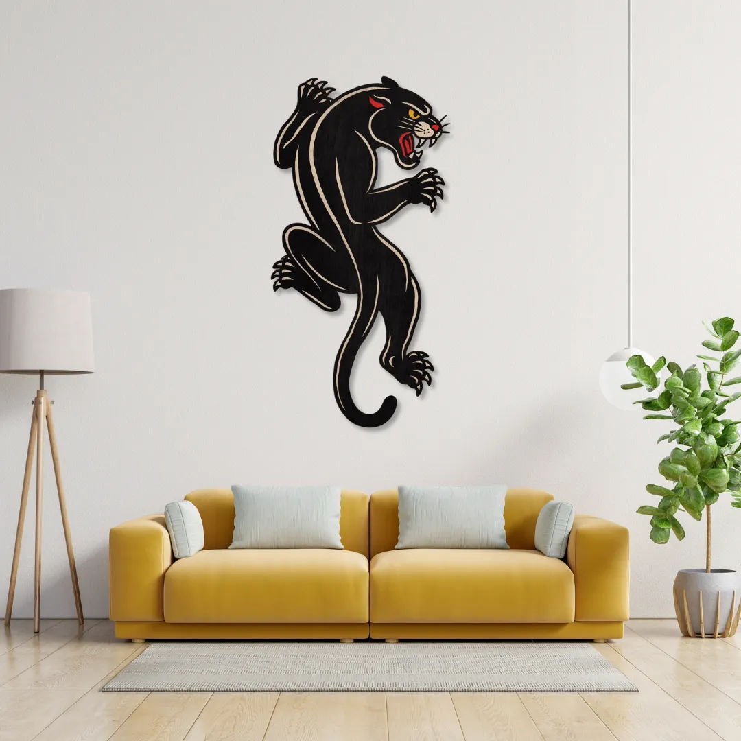 Crawling Panther Wall Art above mustard sofa – handcrafted metal wall decor by Sneagear for bold modern interiors.