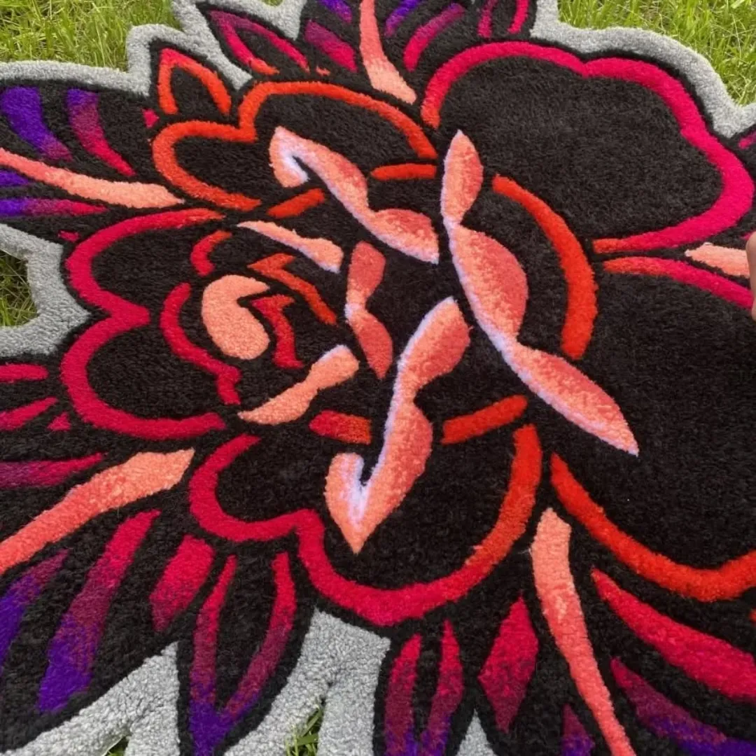 Handmade Crimson Bloom Rug showcasing deep red and purple tones in a modern floral motif