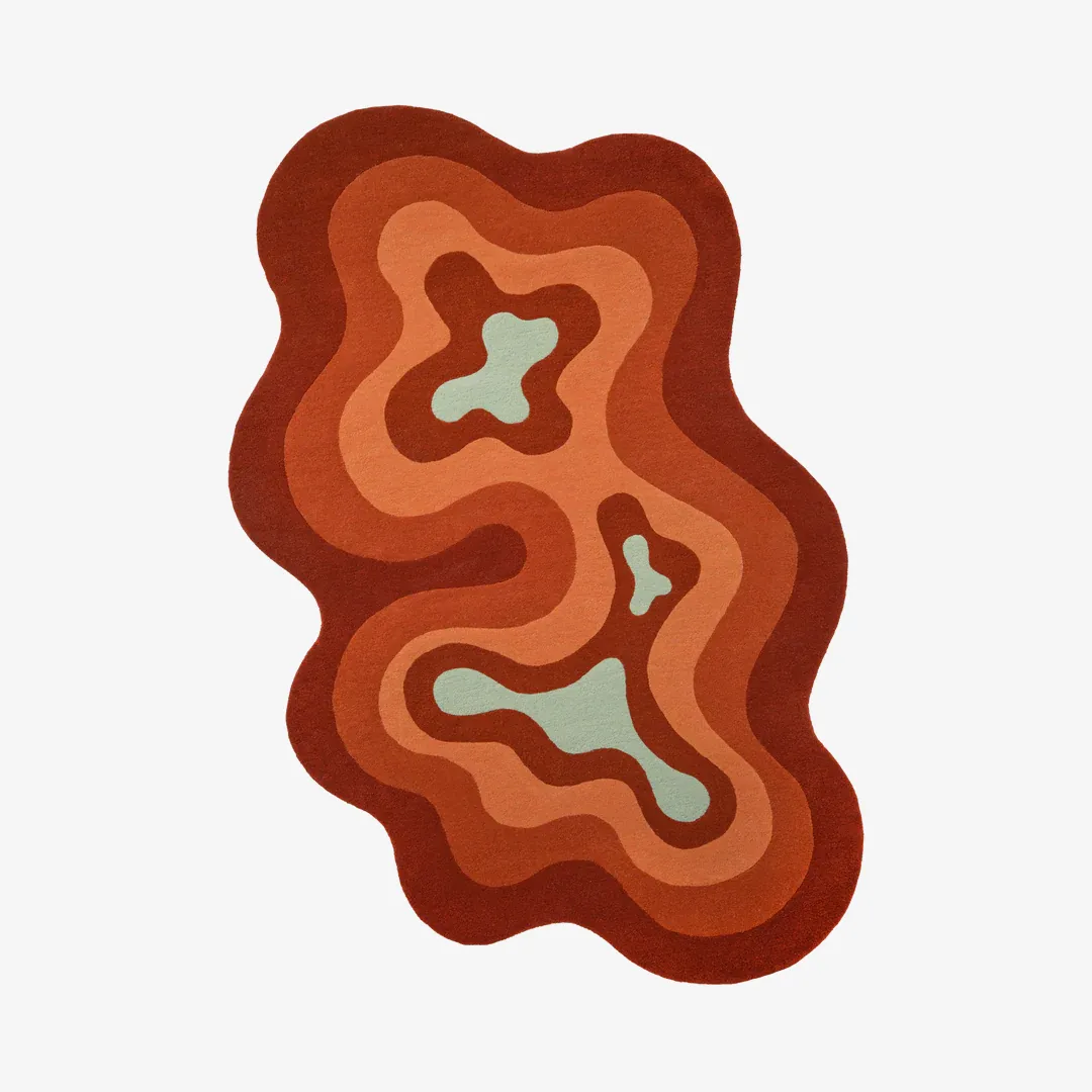 Ember Flow Rug featuring wavy layered design in burnt orange and rust tones – handmade tufted rug by Sneagear