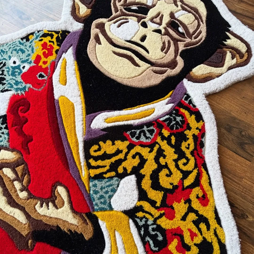 Hanumo Tattoo Rug Artistic monkey rug in bright red, yellow, and turquoise tones – Hanumo handmade tufted design