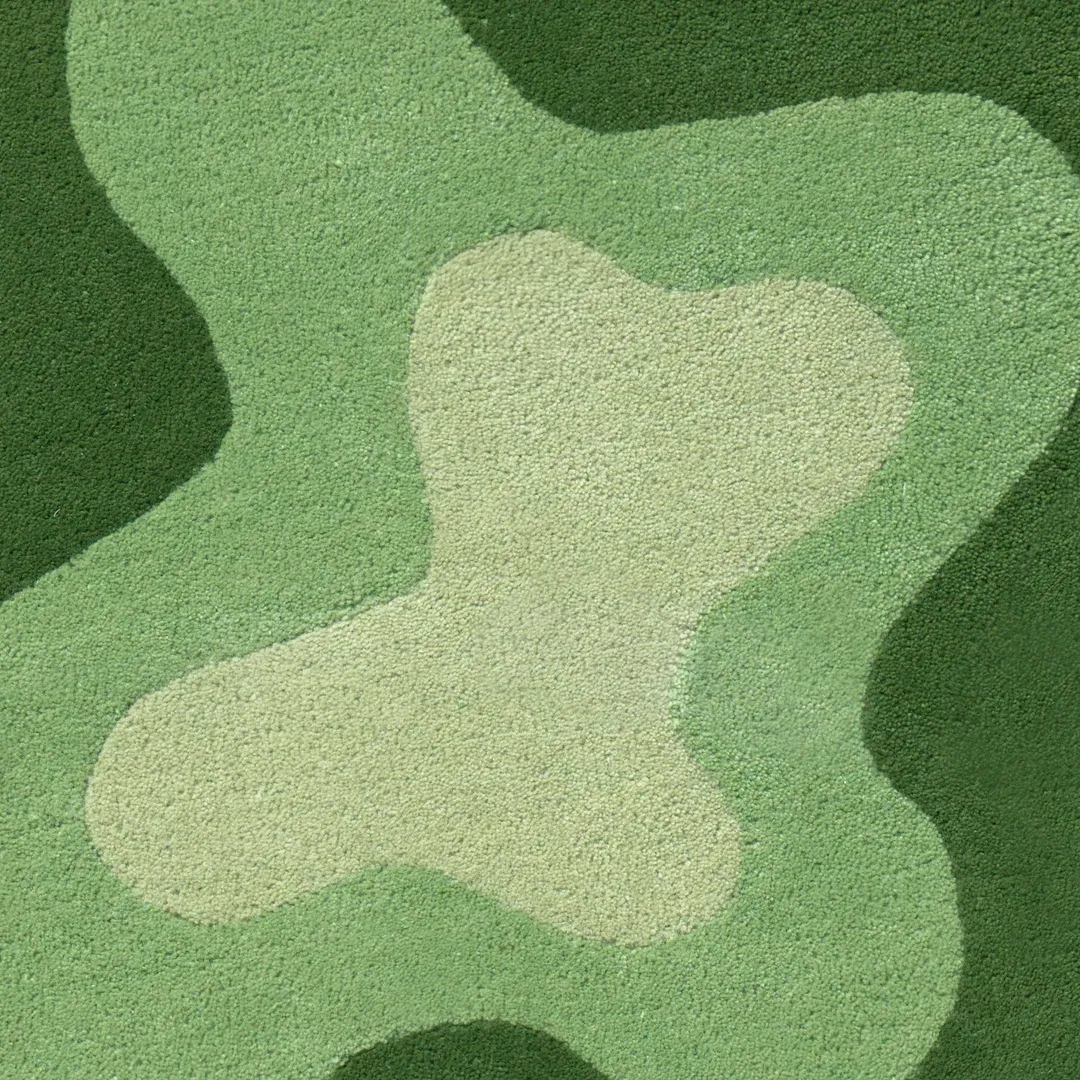 Modern Meadow Wave Rug with fluid wavy pattern in multiple green shades for earthy interiors