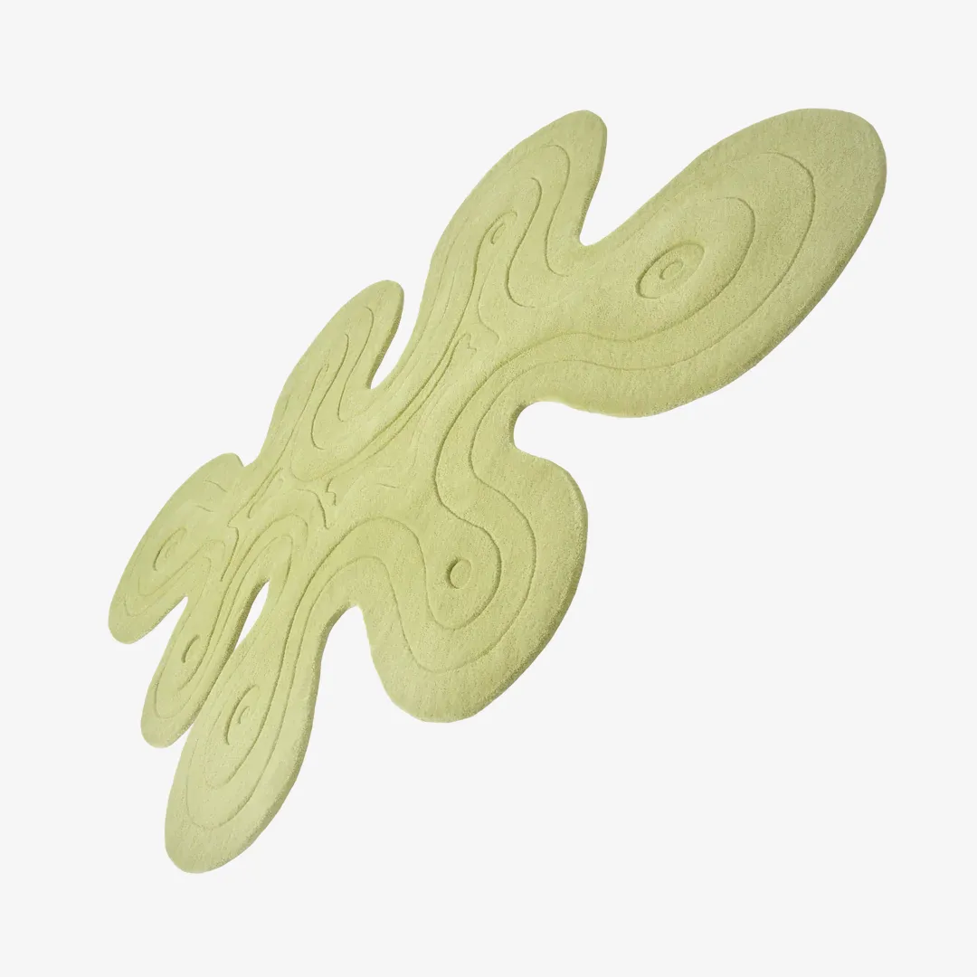 Modern Mint Swirl Rug with flowing embossed design and pastel green hue – hand-tufted wool rug