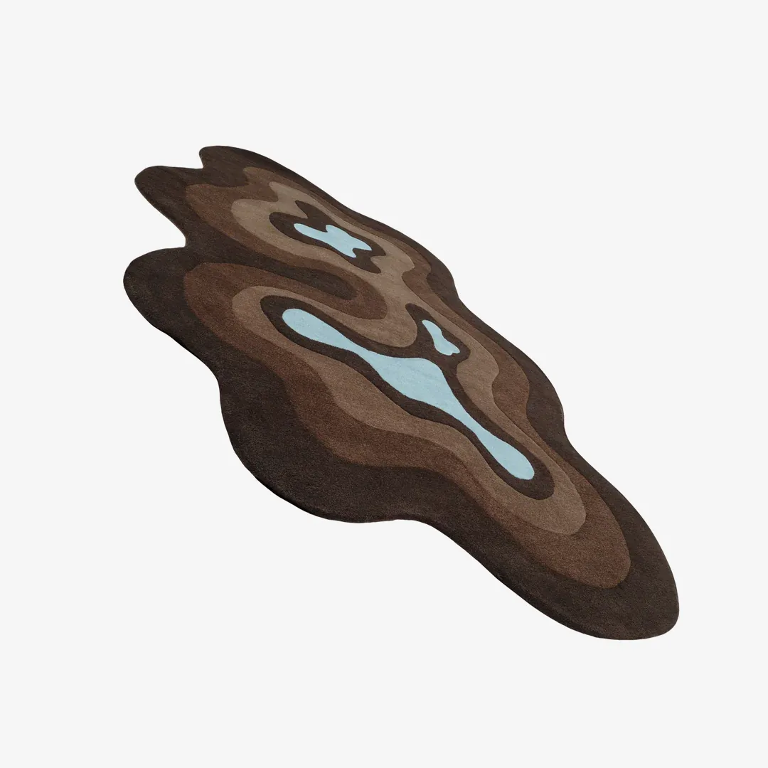 Hand-tufted Mocha Tide Rug showcasing abstract wave design inspired by natural earth and water forms