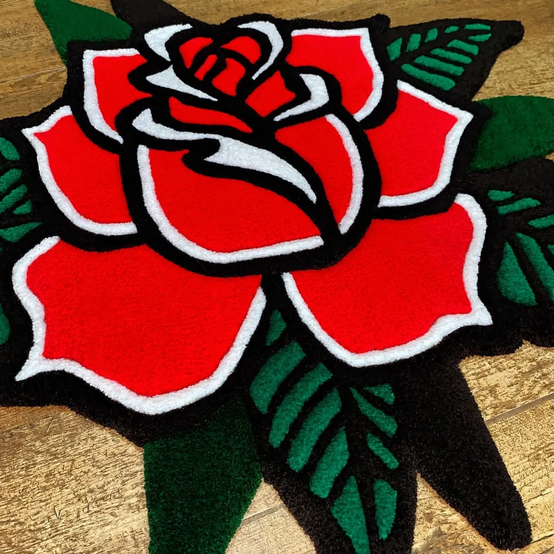 Tattoo-inspired floral rug with red rose and green leaf design – Nocturne Bloom handmade wool rug