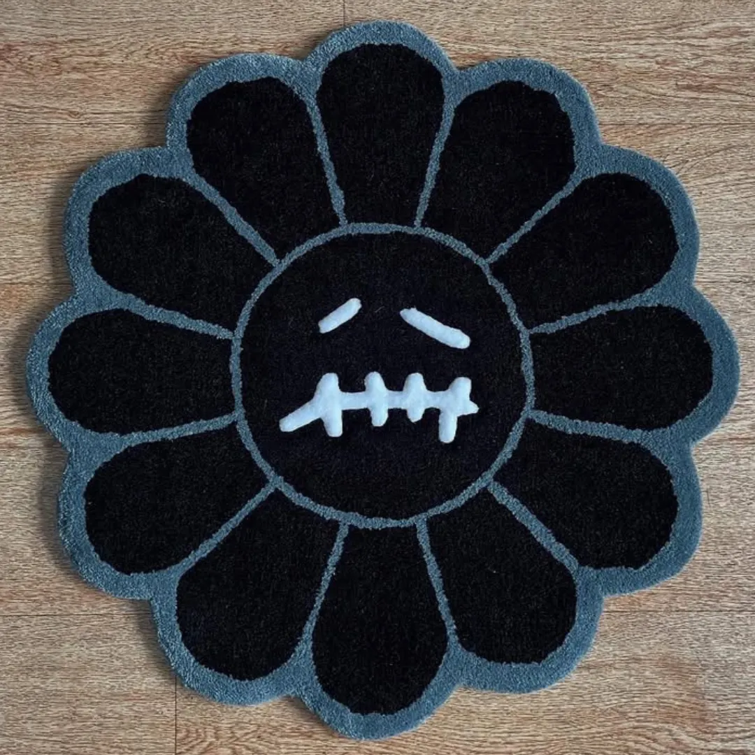 Noir Bloom Rug Noir Bloom Rug – Hand-tufted wool rug in deep black and charcoal tones, featuring a stitched-face floral design inspired by modern minimalism.