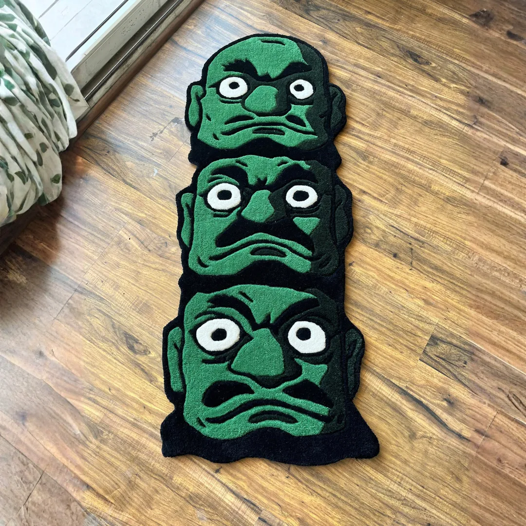 Oni Trinity Rug showcasing Japanese mask art with three expressive faces – modern gothic area rug