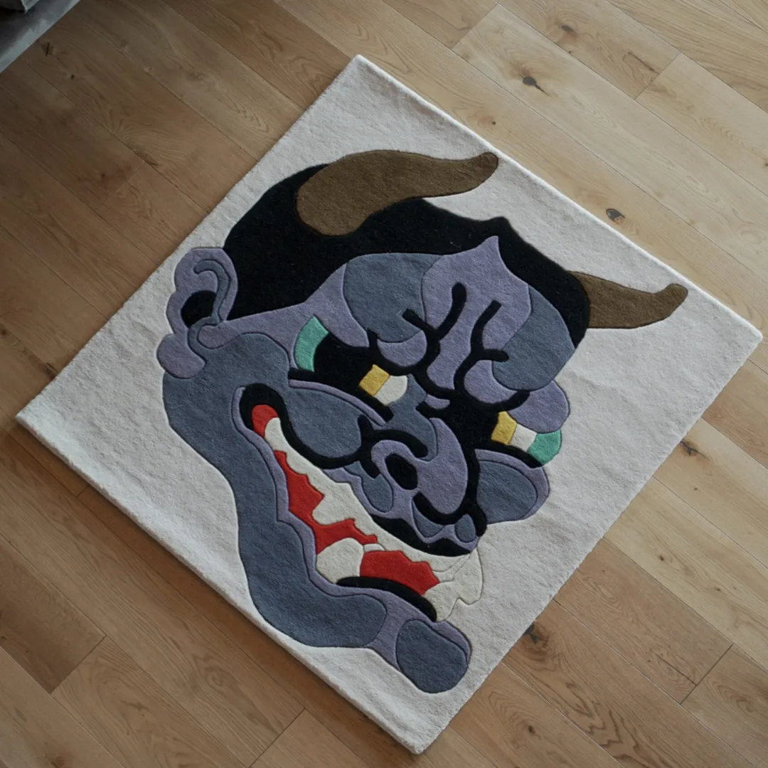 Onyra Hand-Tufted Wool Rug with Bold Mask-Inspired Design in Charcoal and Red