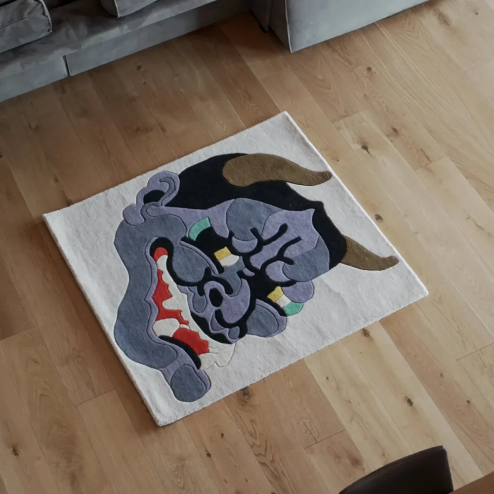 Onyra Rug Featuring Japanese Mask-Inspired Design in Black, Red, and Violet