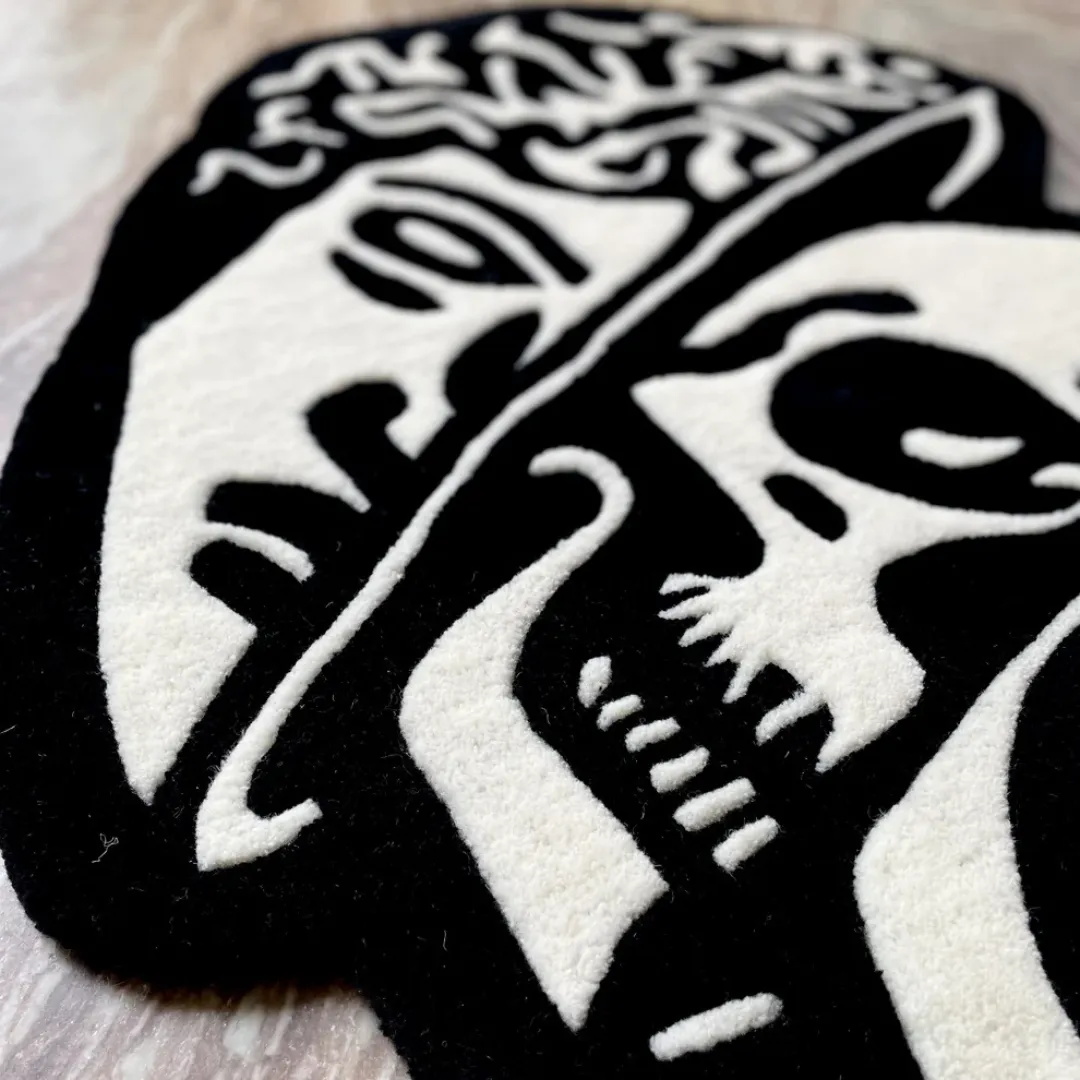 Handmade gothic rug with twin skulls and smiley centerpiece – Twin Reaper designer rug by Sneagear