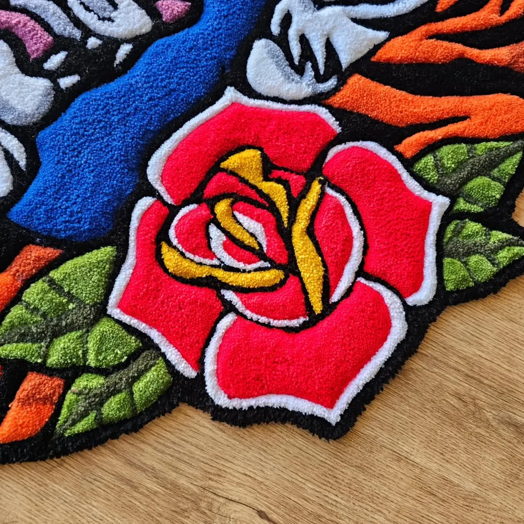 Hand-tufted tiger rug with bold orange stripes and red rose accent – Twin Fury design