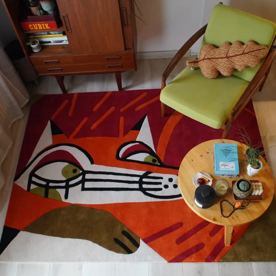 Vulpira Rug Setup Artistic Vulpira Rug Showcasing Abstract Fox Design in Warm, Vibrant Colors