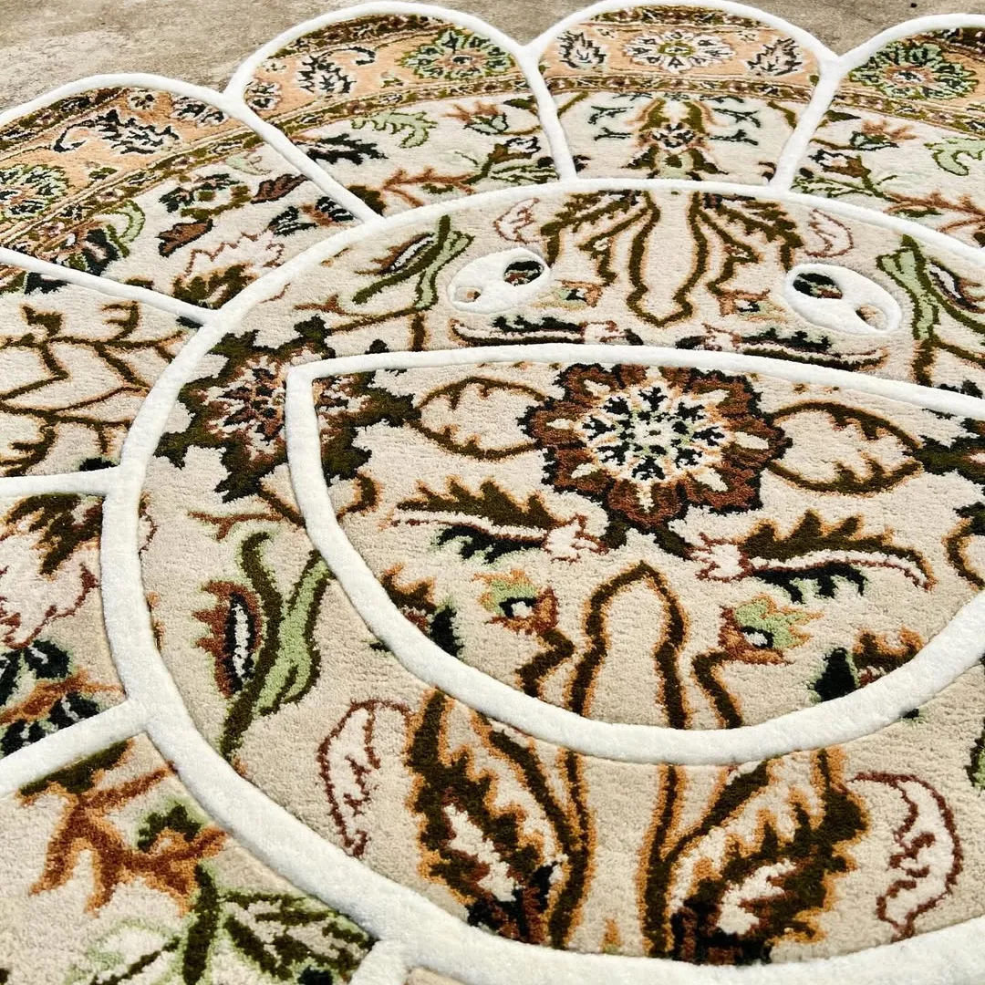 Whisper Bloom Takashi Rug Elegant flower-shaped Whisper Bloom Rug made from 100% wool, blending ivory and golden-brown tones in detailed Persian-inspired patterns.
