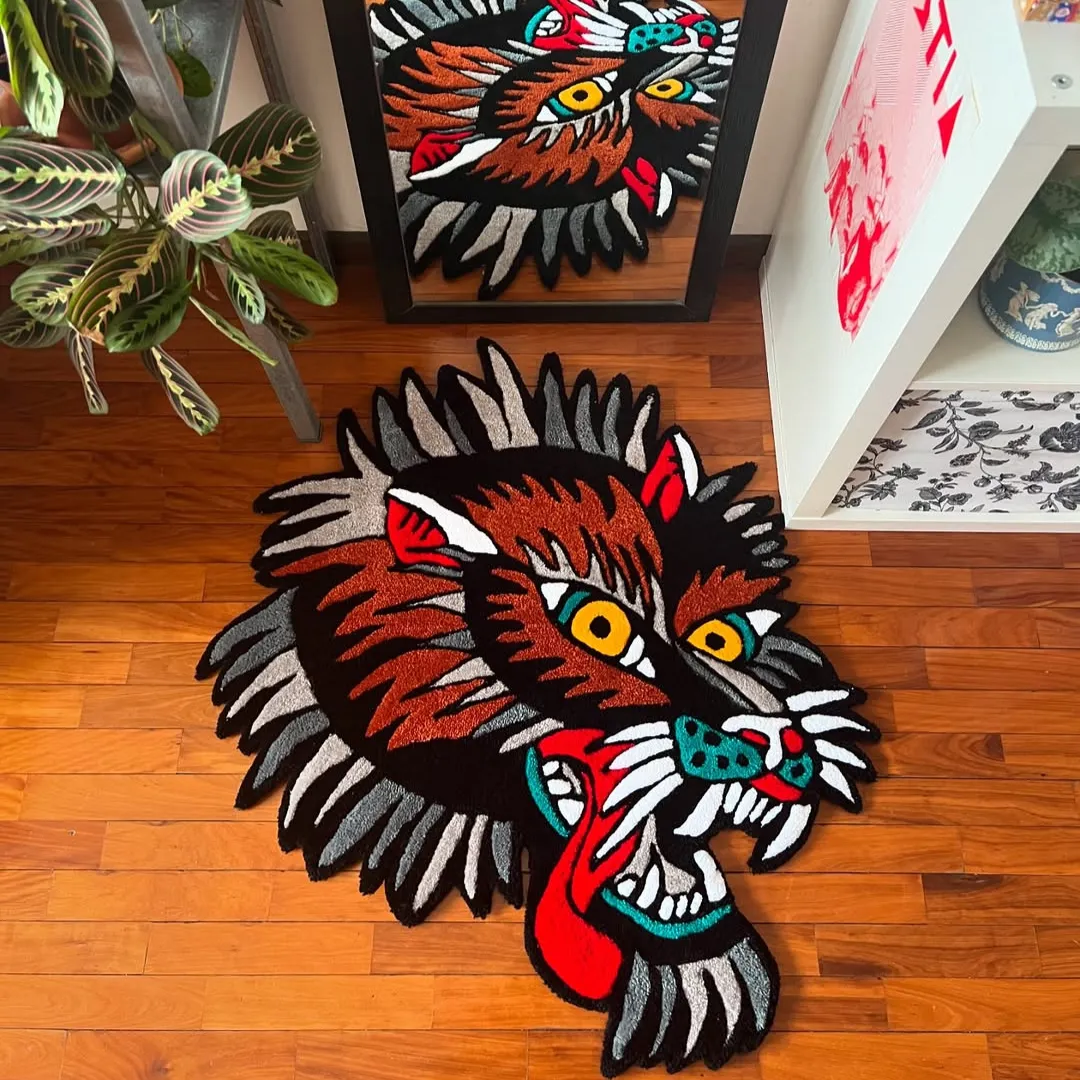 Wild Howl Rug featuring fierce wolf face design with red tongue and yellow eyes – hand-tufted rug by Sneagear