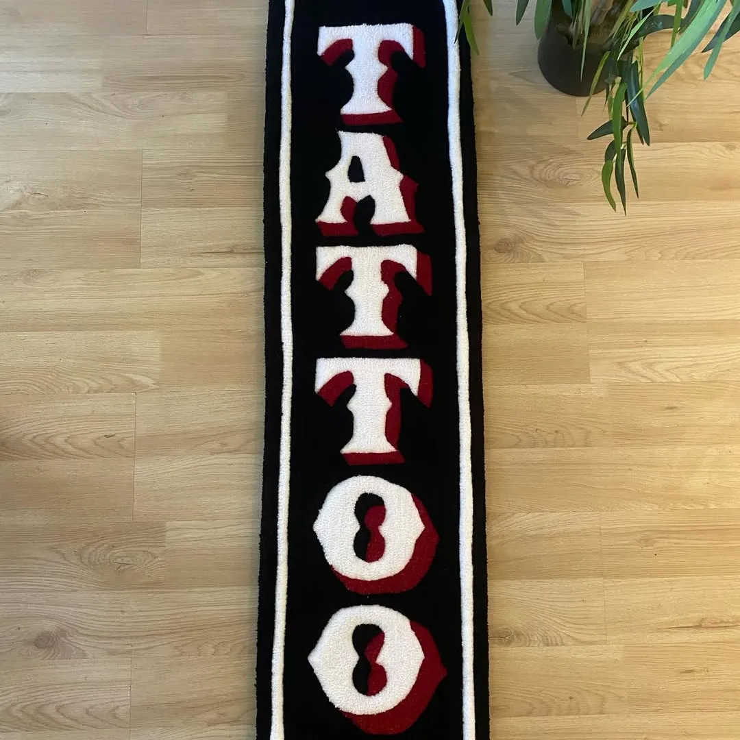 Tattoo-style rug with vintage typography in red, white, and black – Classic Script Rug