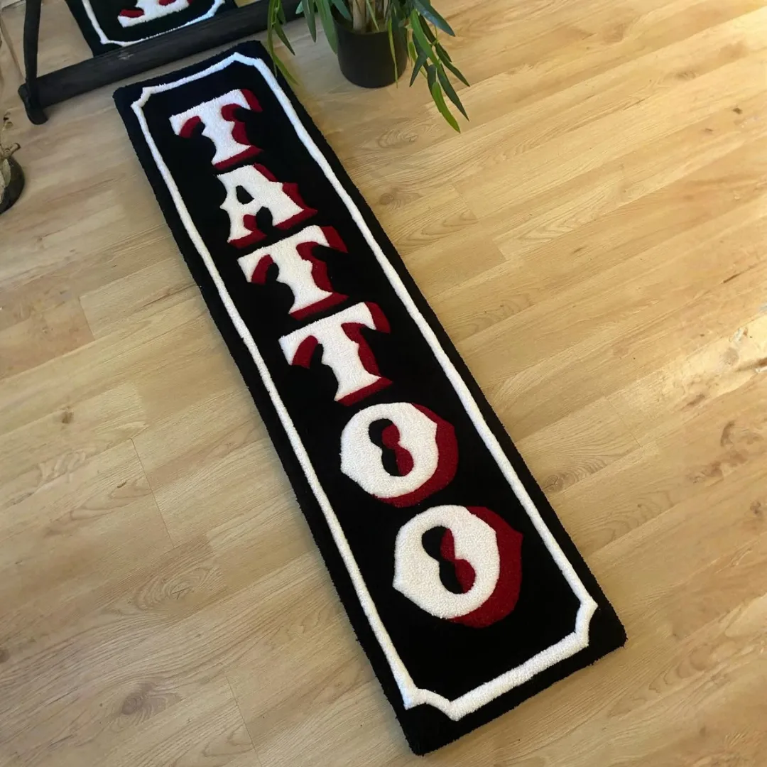 Classic Script Rug featuring bold tattoo lettering design – handmade wool runner by Sneagear