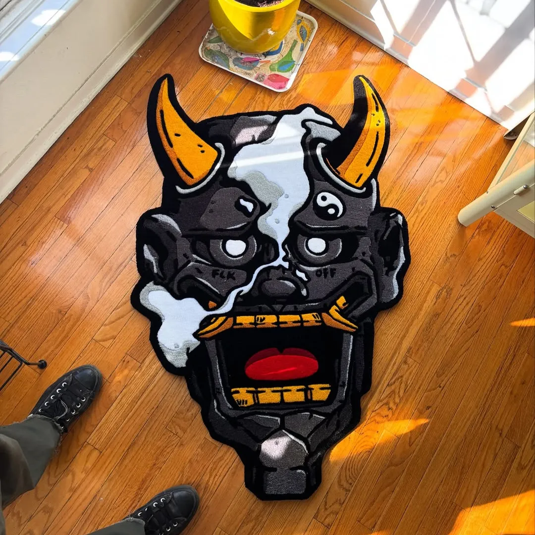 Demon Veil Rug Demon Veil Rug featuring a bold horned mask design in black, grey, and gold – hand-tufted art rug by Sneagear