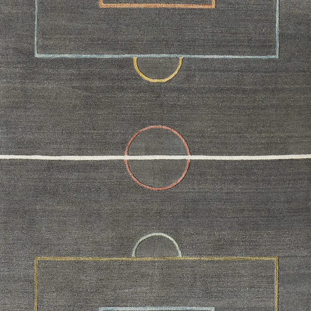 Contemporary wool rug with soccer field outline in soft pastel tones – Goal Grid rug