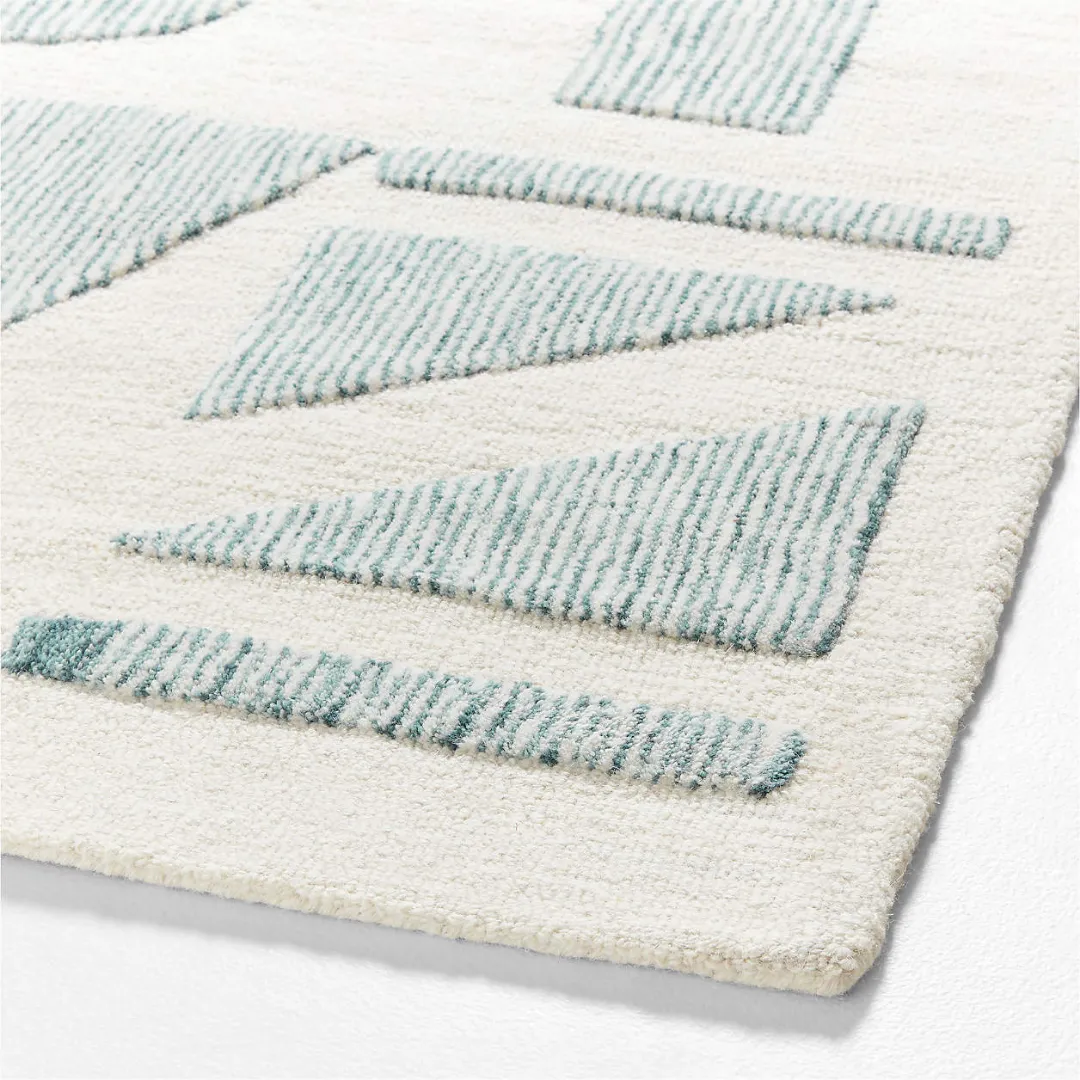 Handmade Minted Letters Rug showcasing bold alphabet shapes in pastel mint tones