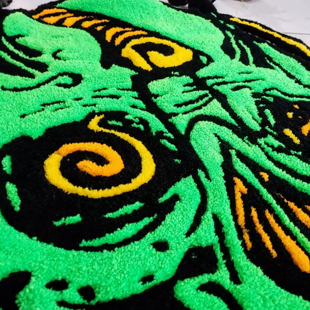 Psychedelic green skull rug – Neon Rot hand-tufted area rug with bold black and orange accents