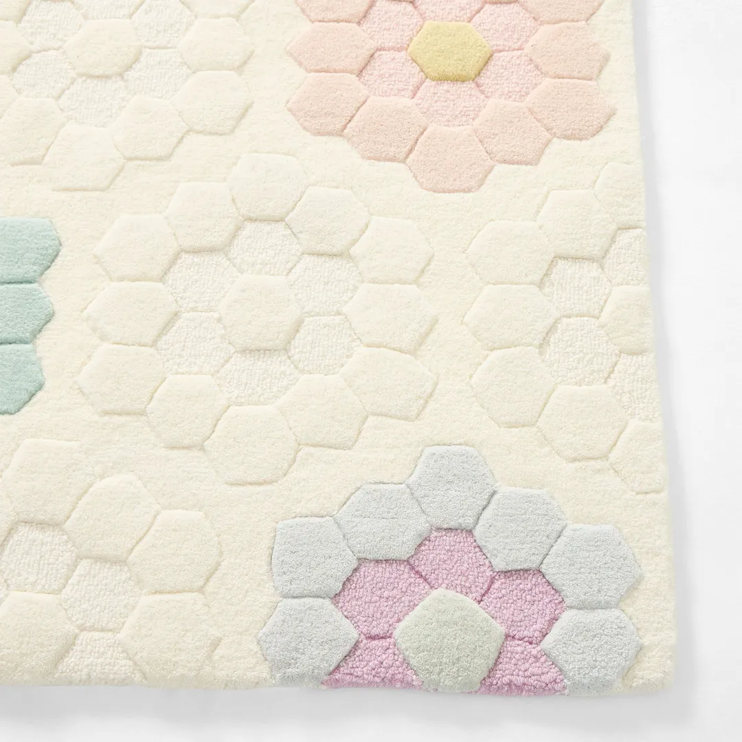 Geometric floral rug with pastel-colored hexagon petals – Pollen Prism handmade wool rug