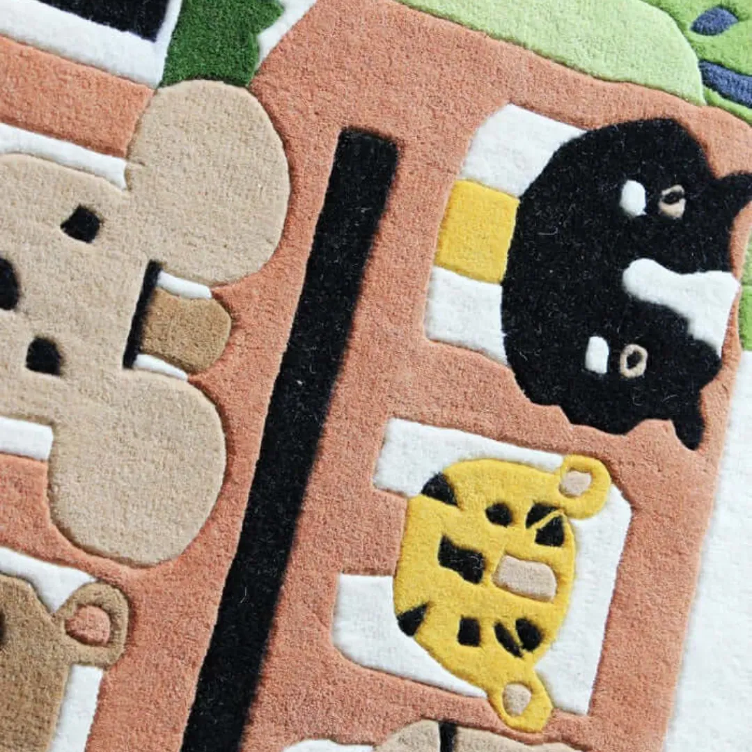 Hand-tufted Safari Ride Rug with adorable zoo animals on a bus – kids’ wool area rug
