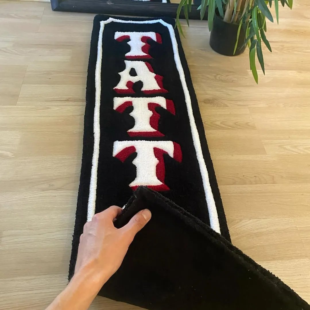 Hand-tufted wool runner rug with tattoo shop inspired lettering – Classic Script Rug by Sneagear