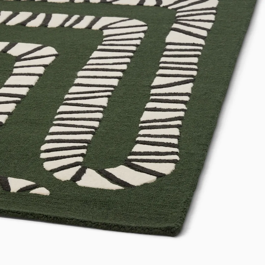 Whimsical snake rug in green and cream tones – Ziggy Snake Path hand-tufted design