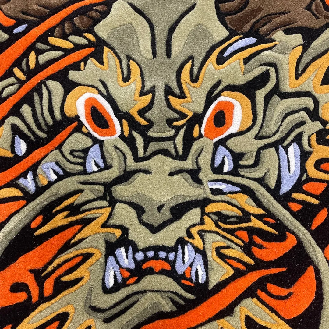 Handmade wool rug with striking dragon head and orange fire accents – Hellfire Spirit Rug